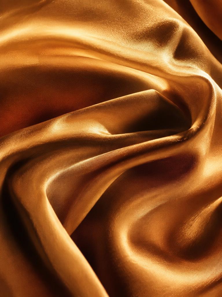 Warm golden silk representing a light sunkissed spray tan finish